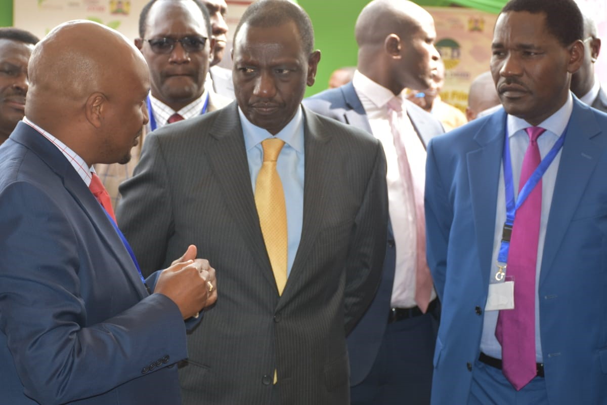 CEO Mr. Amos Wangora(left) welcomes Deputy President H.E Williams Ruto to the KenTrade stand during the KenyaTradeWeek 2018 at KICC grounds Nairobi