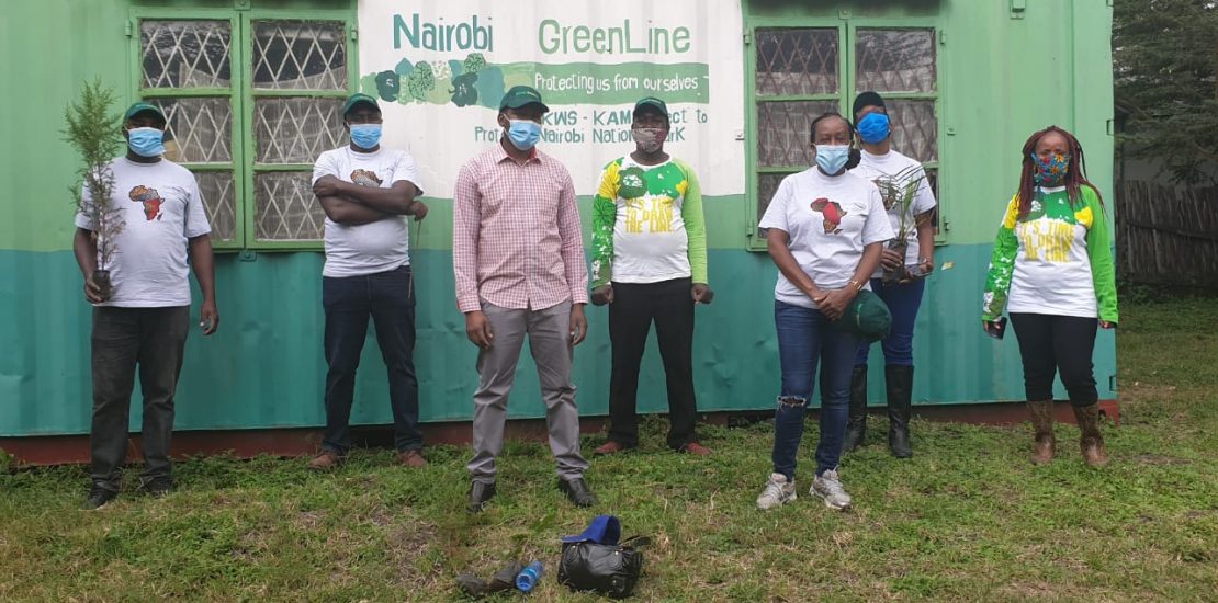 KenTrade staff during a tree planting exercise to increase forest cover.